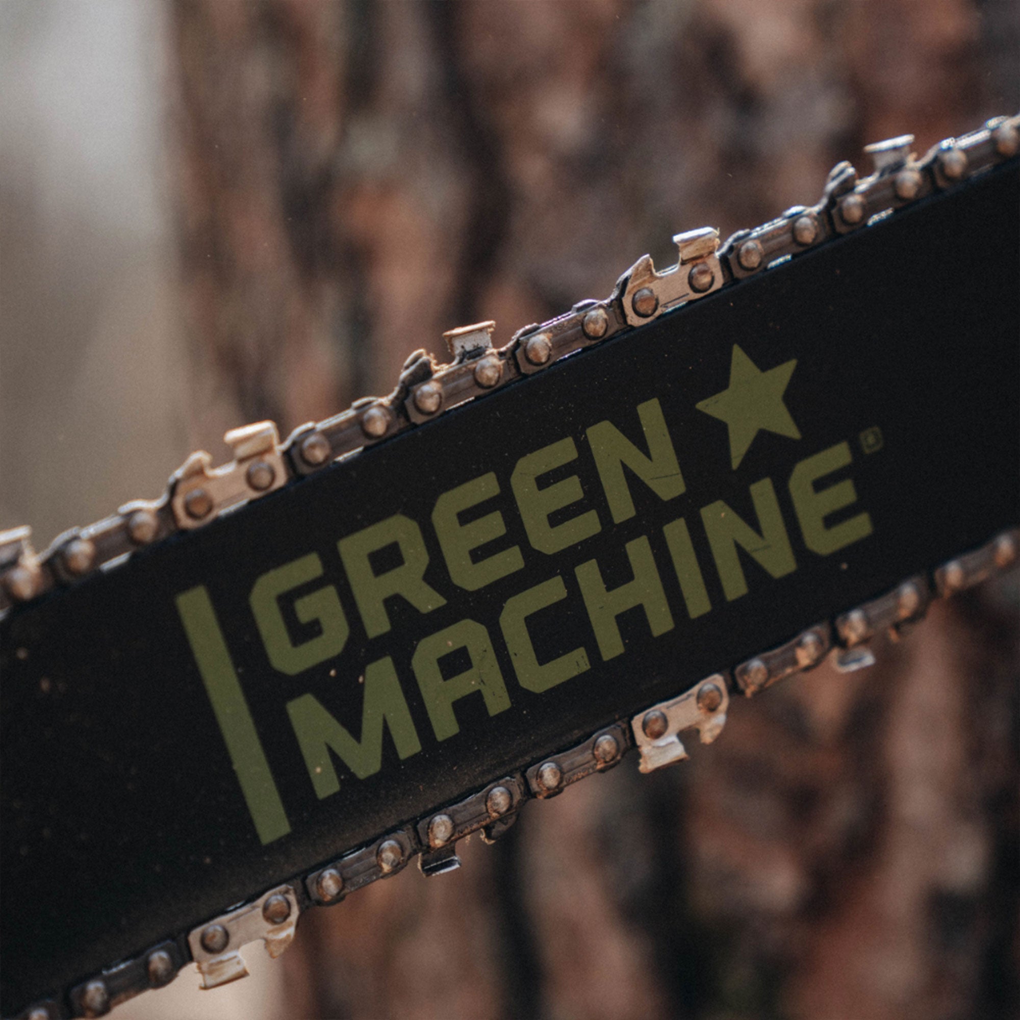 Close up of Green Machine chainsaw.